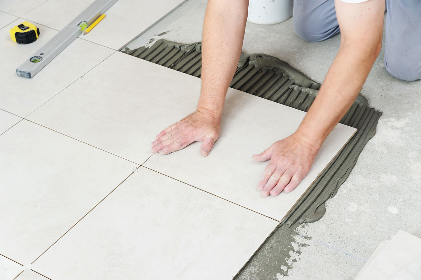 Pose revêtement sols intérieurs et extérieurs